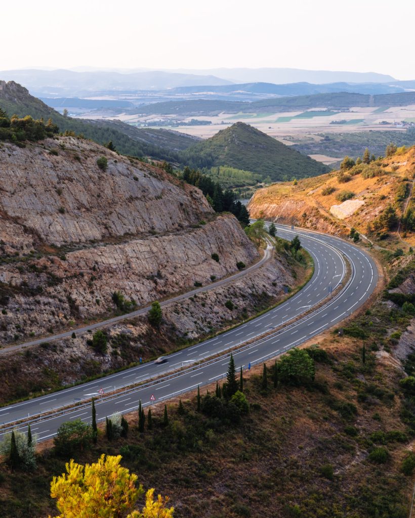 Aerial view of highway through mountains in Rioja Region of Spain